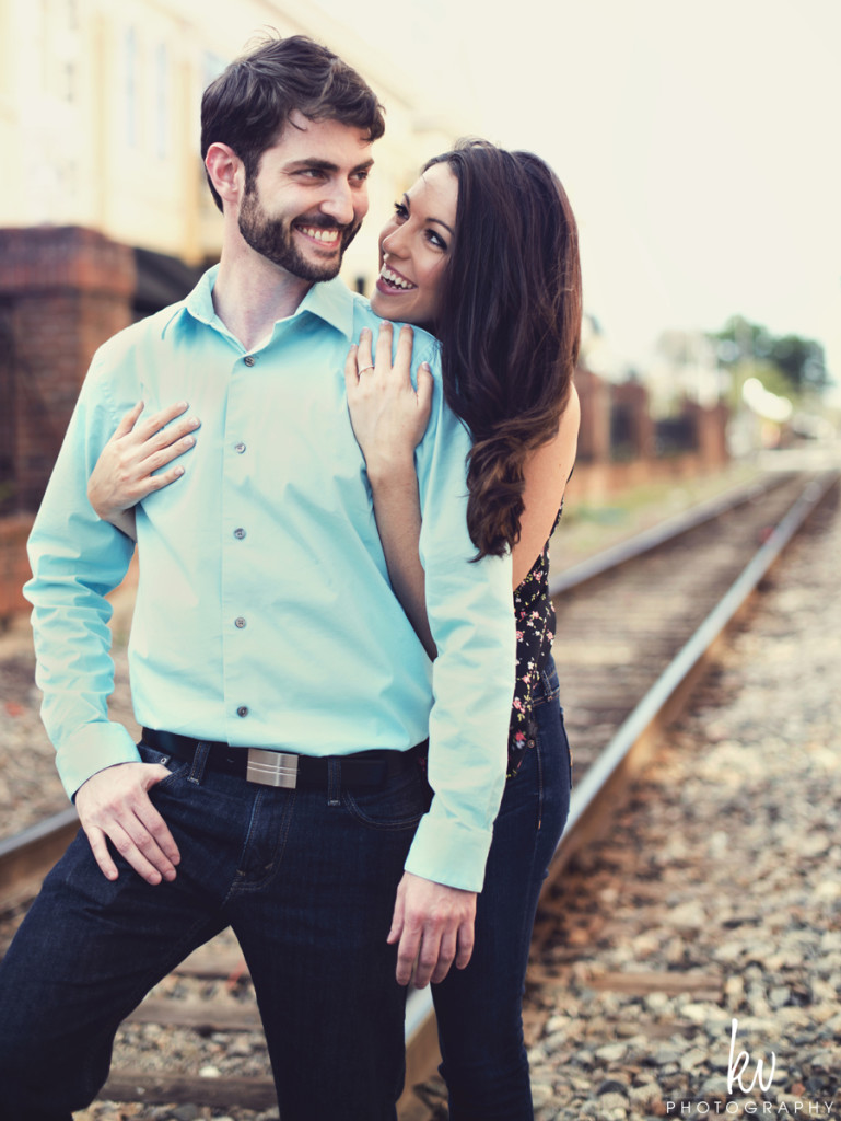 Hug in the rail road tracks - kv photography - orlando wedding photographers
